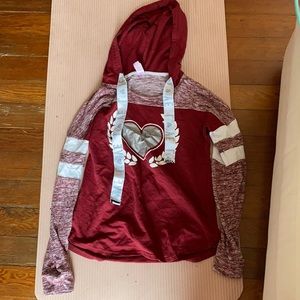 Cute hoodie! It’s not the warmest, but it’s cute for spring time!